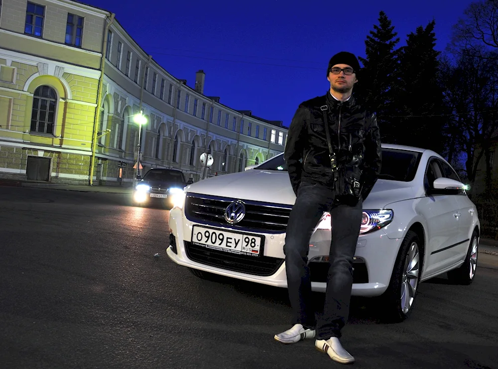 Photos near a man's car