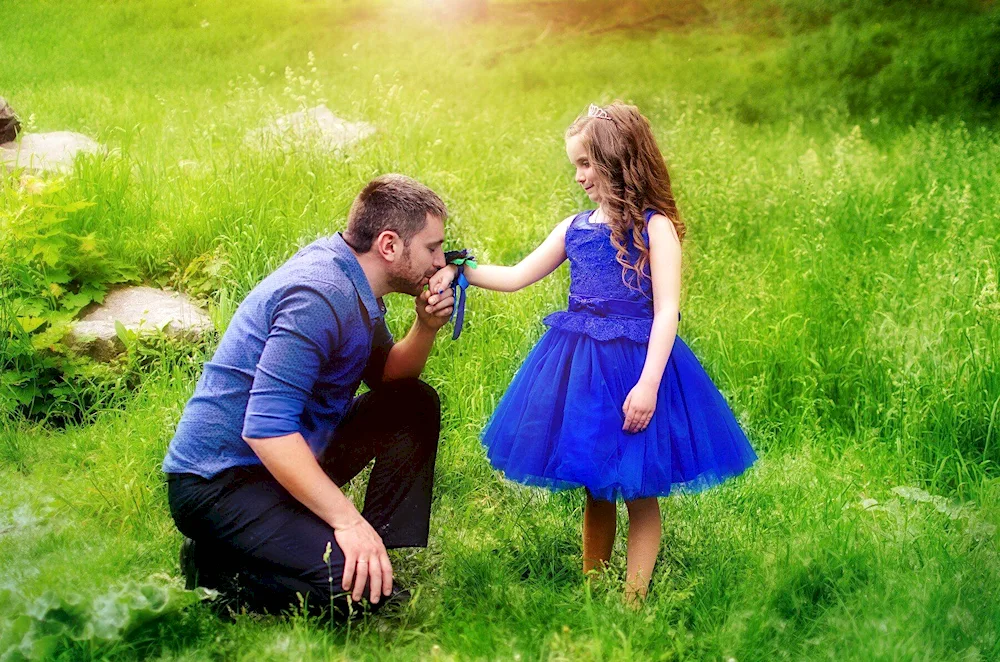 Father and daughter from back