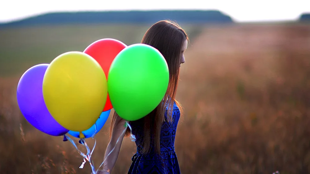 Girl with balloons