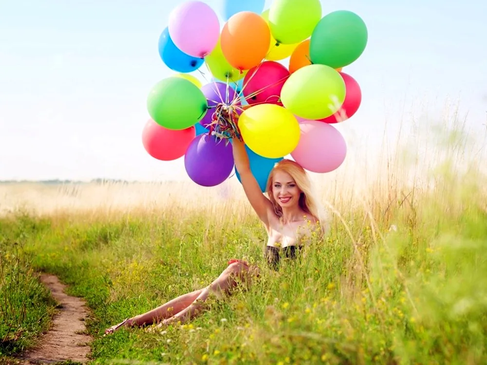 Girl with balloons with balloons