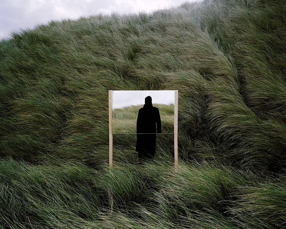 Photoshoot with a mirror in a field