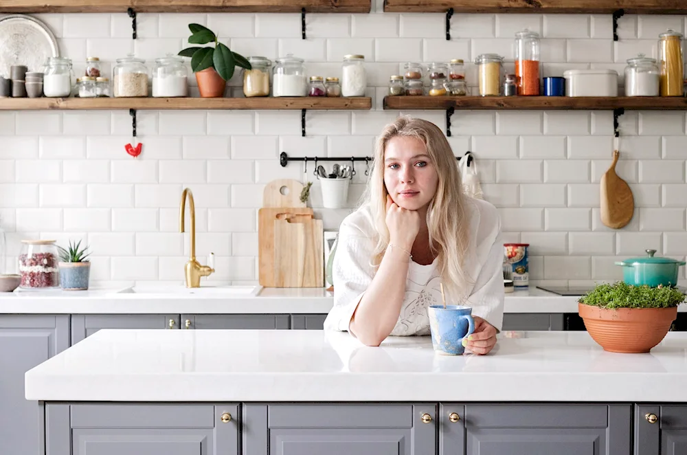 Girl in the kitchen. in the kitchen