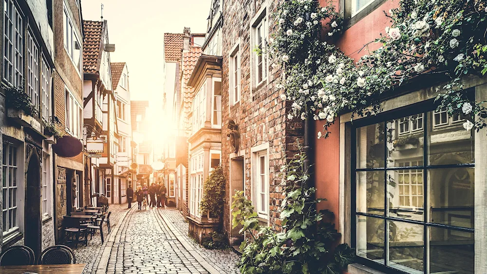 Frescoes of German streets with cafes.