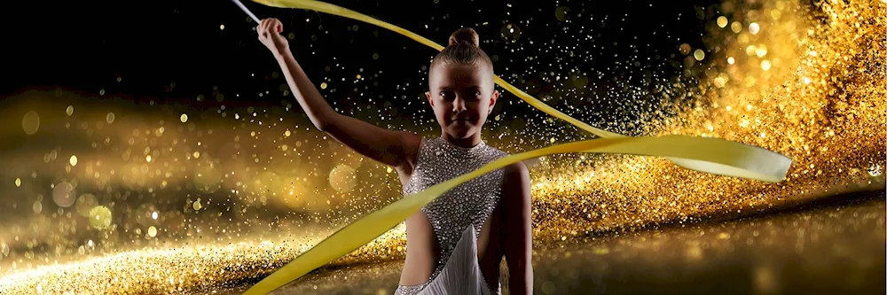 Gymnast in vault with ribbon