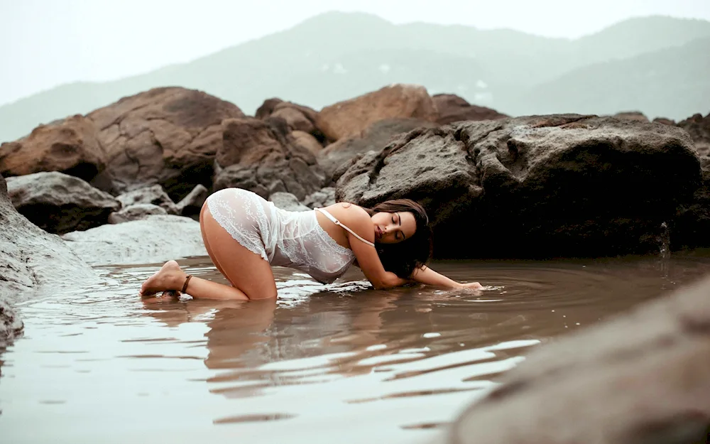 Breasts in water