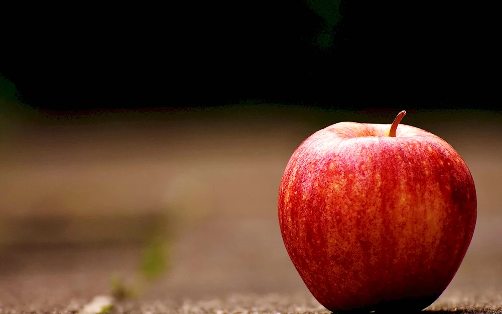 Apples on the red table