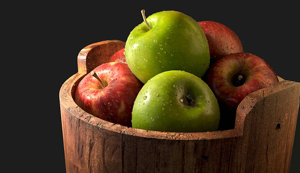 Apple on the table on the dark background