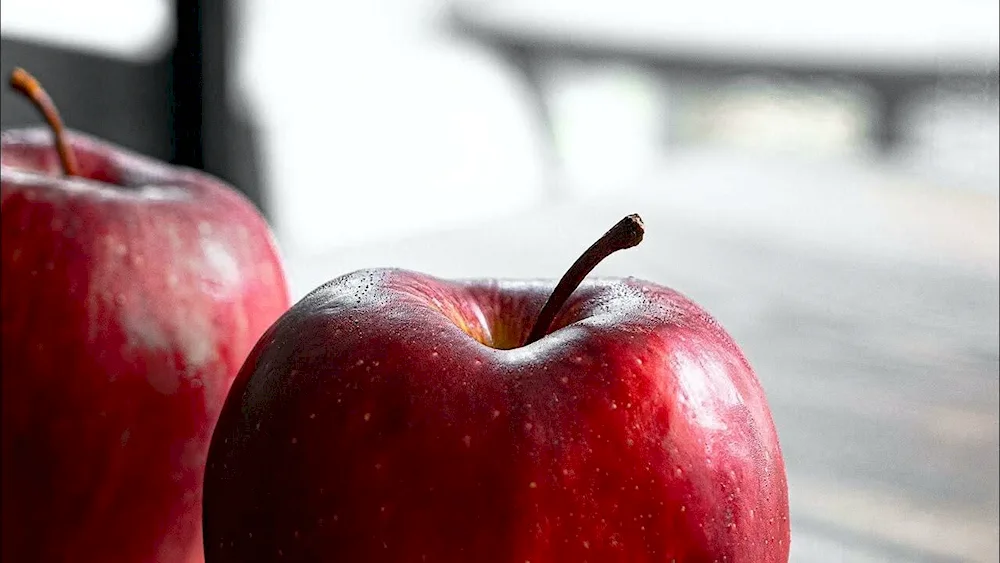 Apple on the red background