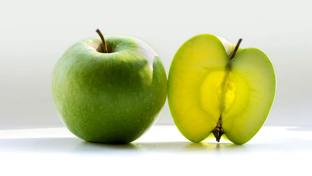 Apple on the red background