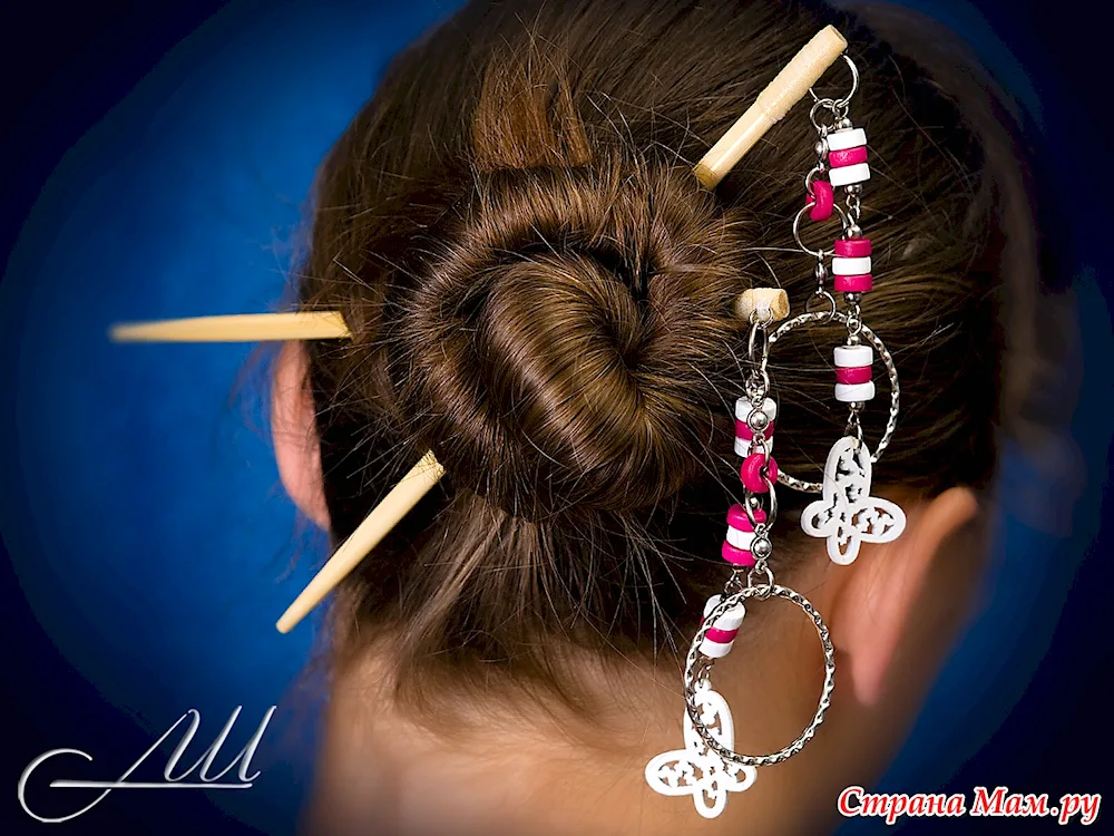 Bun with chopsticks. chopsticks