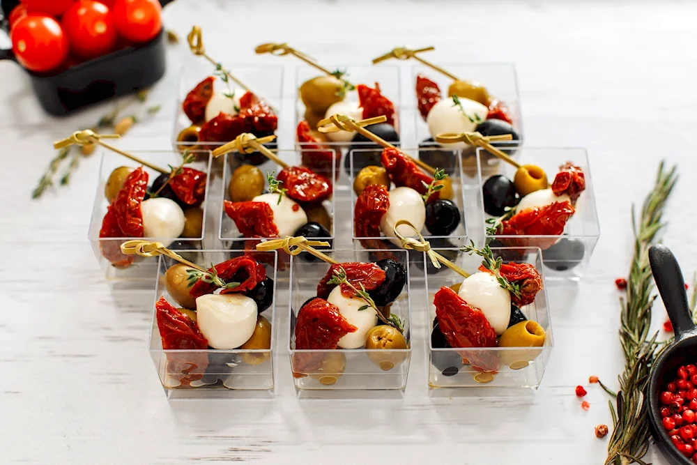 Canape mozzarella with cherry
