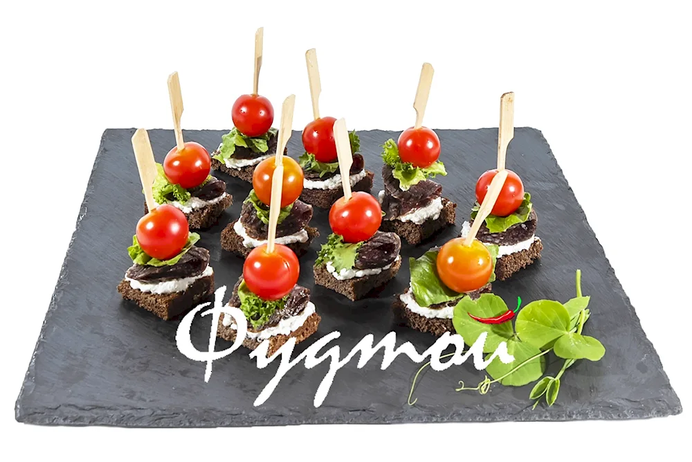 Canape with jamon on skewers