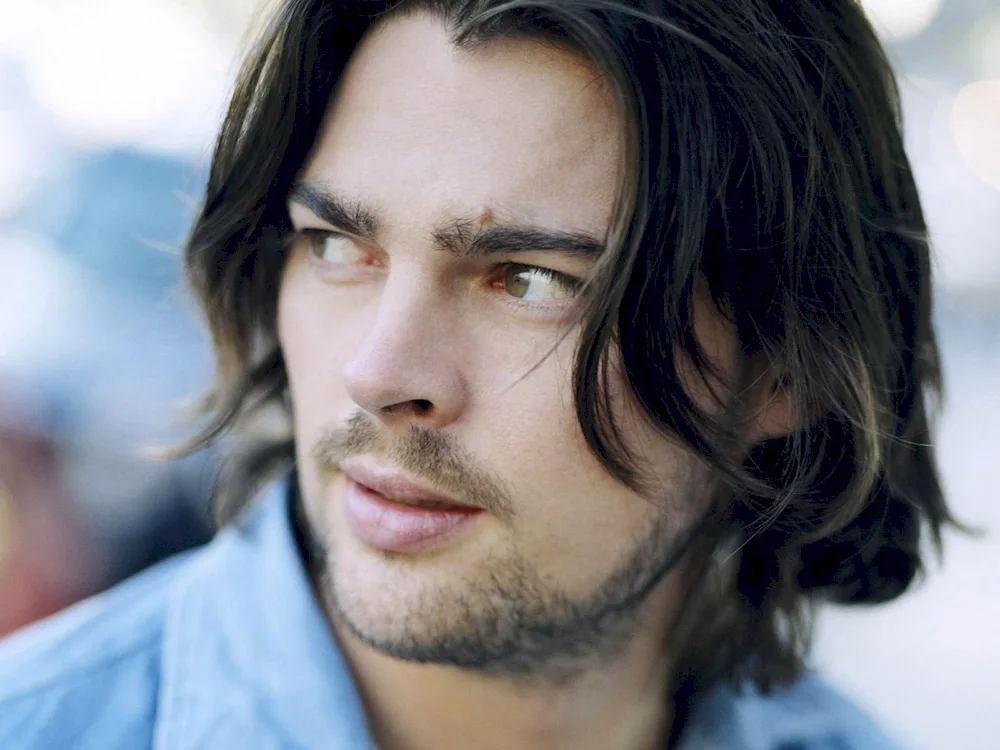 Karl Urban with long hair