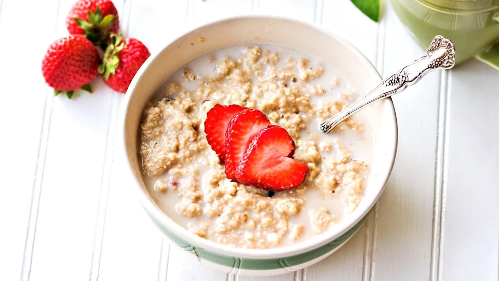 Wheat porridge plate with fruit