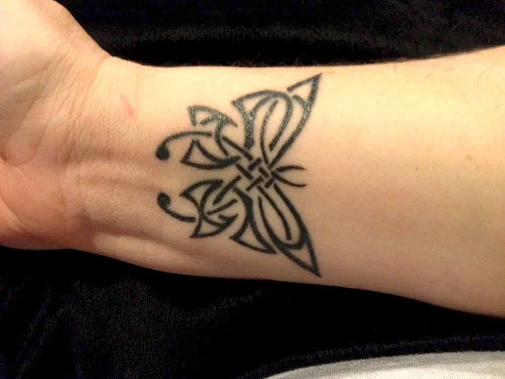 Lotus tattoo on wrist