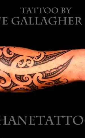 Celtic tribal tattoo on forearm