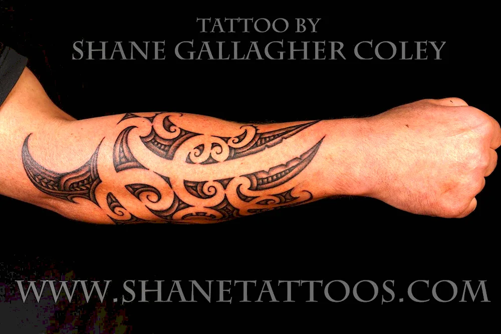 Celtic tribal tattoo on forearm