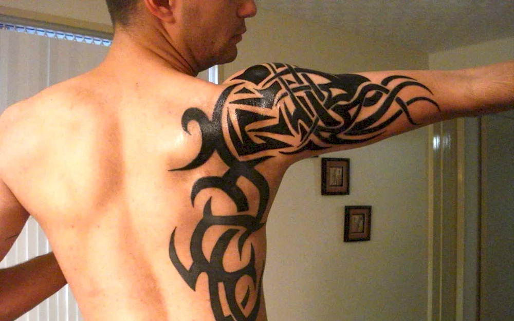 Celtic tribal tattoo on shoulder