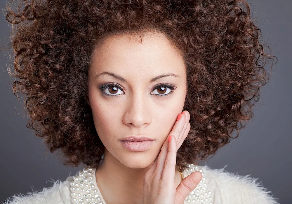 Kat Graham Afro curls.