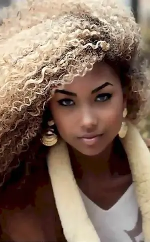 Kat Graham afro curls