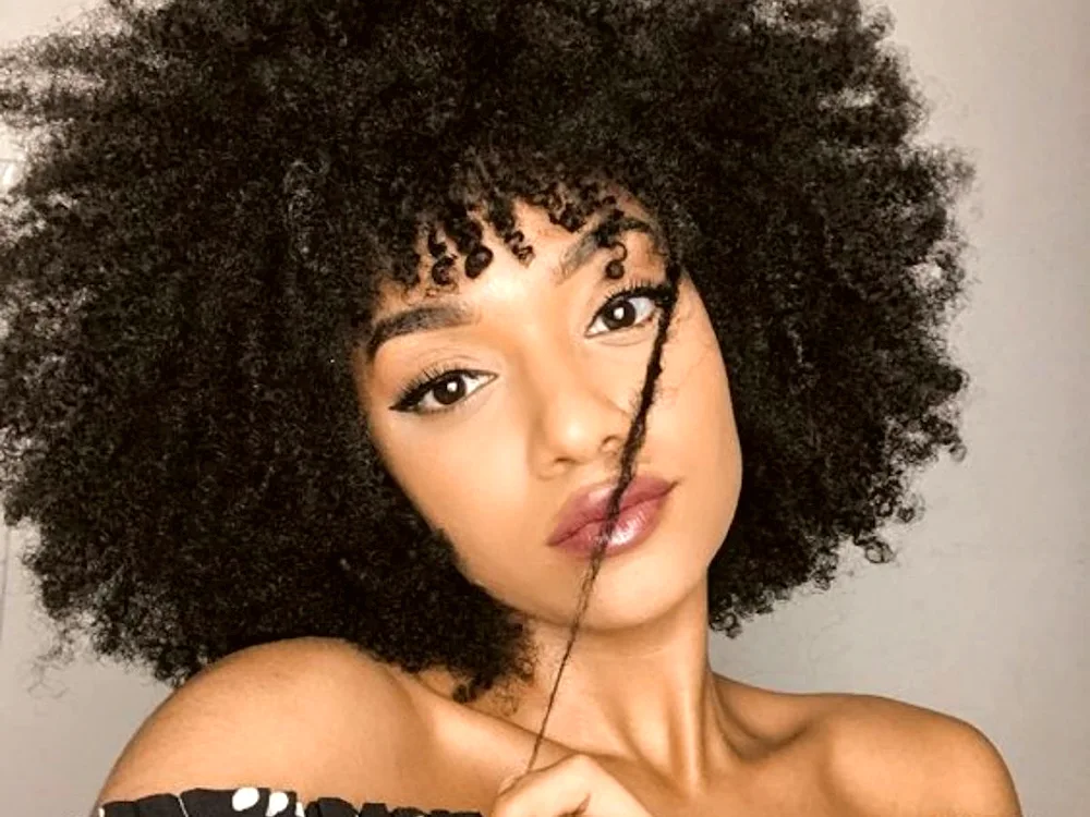 Cat Graham afro curls