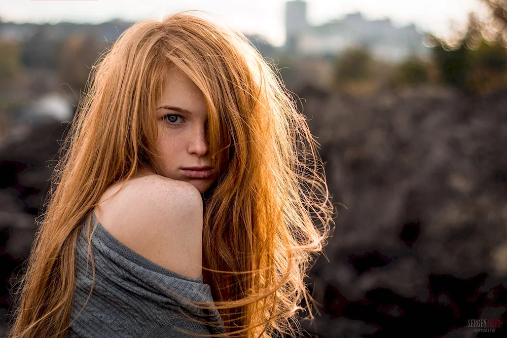 Girl in an unbuttoned blouse