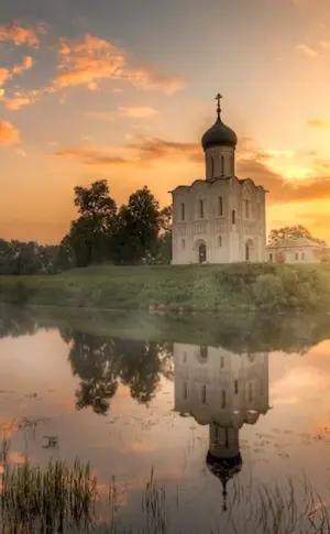 The Church of the Intercession of the Intercession on Nerli dawns. Vvedensky Monastery on the Tolga River