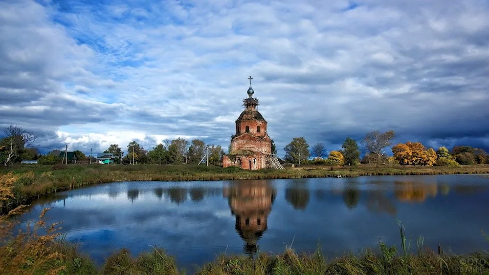 The Church of the Transfiguration of the Lord. St Basil the Great River in the fog