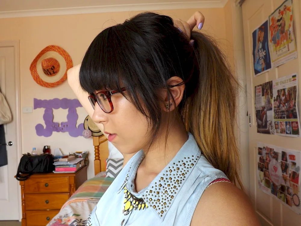 A ponytail with long bangs
