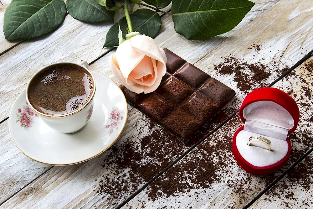 Cup of coffee and candy on the table