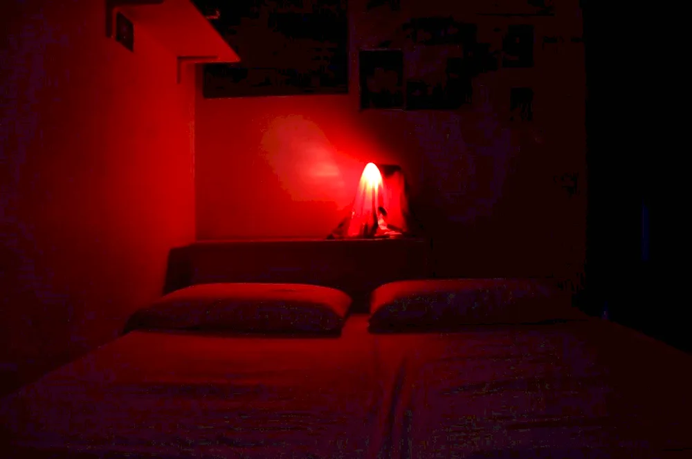 Dark room with a bed in the dark