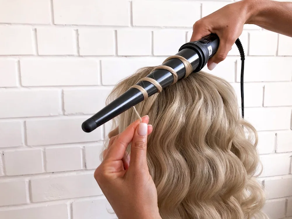 Curls on a curling iron for long hair