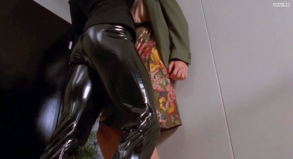 Cory Everson in leather pants