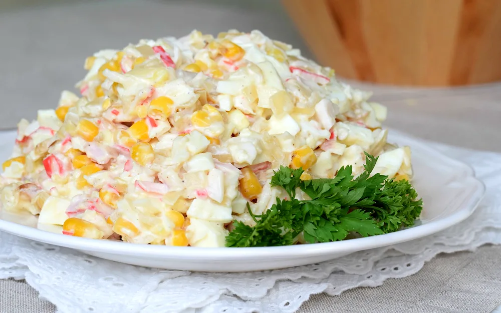 Salad with crab sticks and corn and cucumber