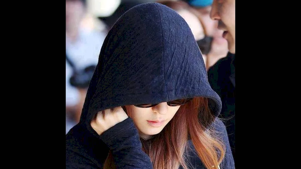 A beautiful girl in a hood