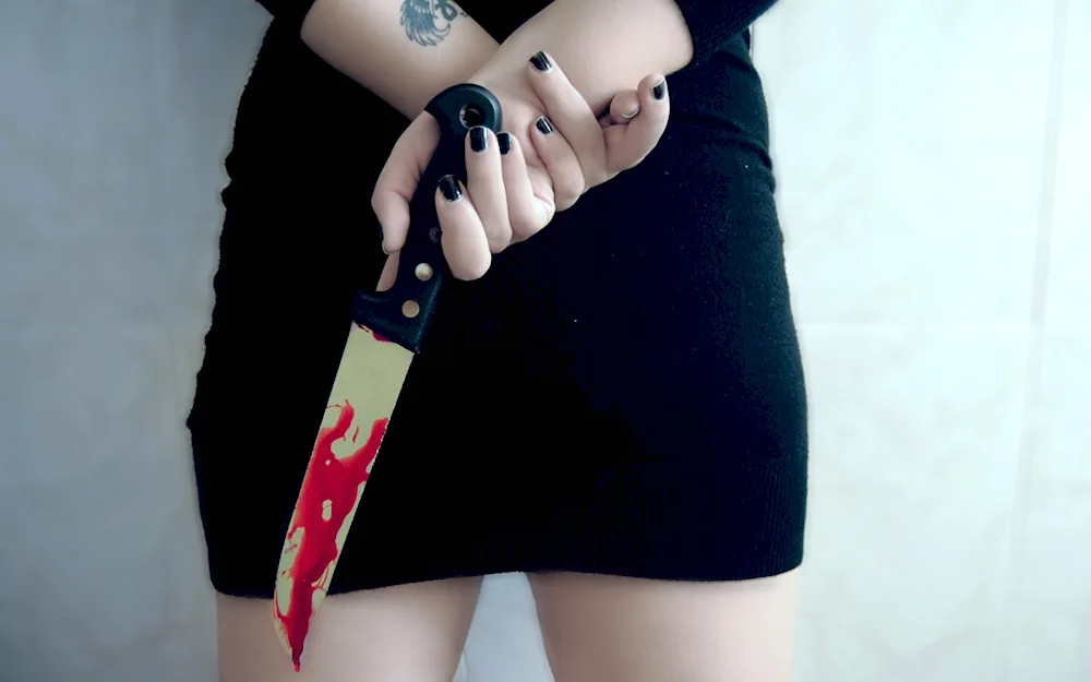 Girl with bloody knife