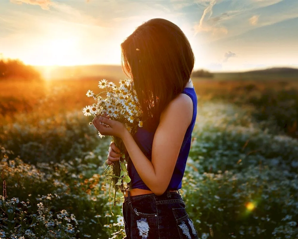 Beautiful girls with daisies