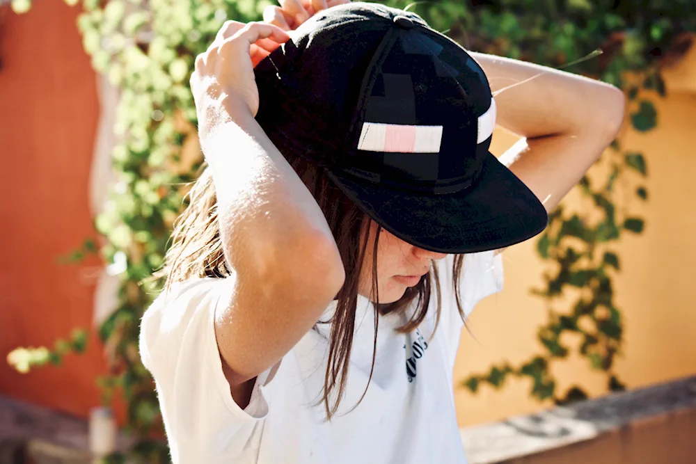 Beautiful girls in baseball caps