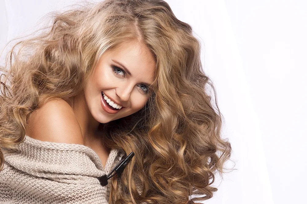 Katya Vasilenko with curly hair hair