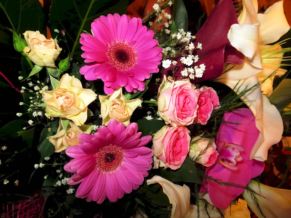 Bouquet of flowers on the bed