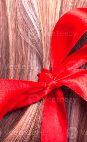 Red ribbon in her hair