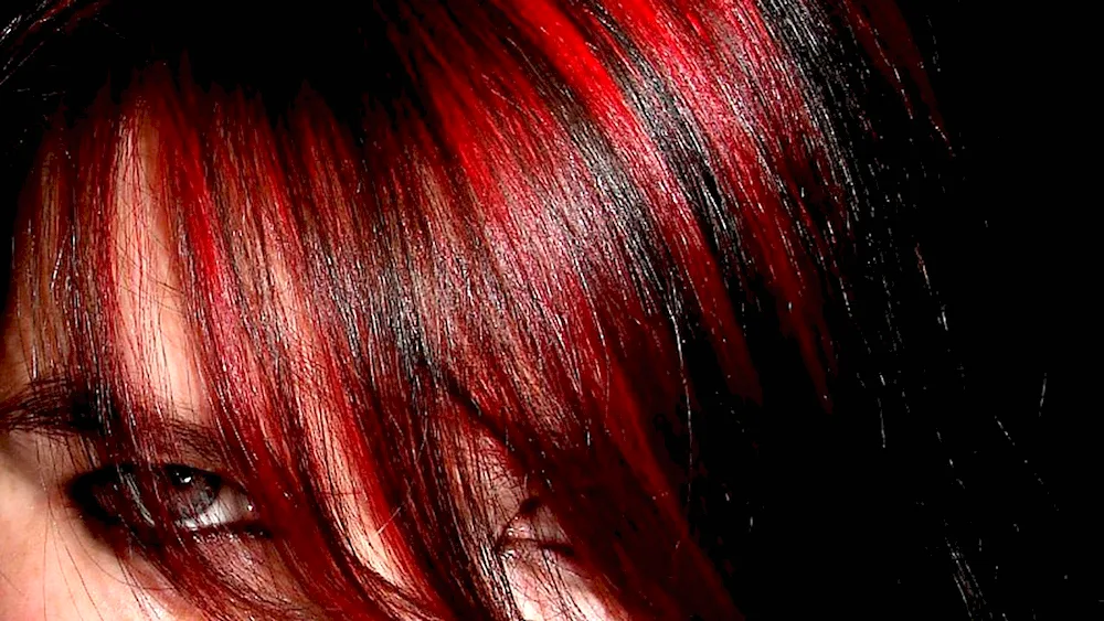 Red colouring on dark hair