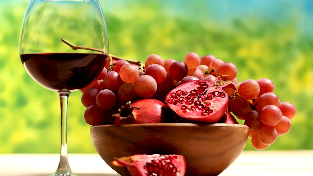 Wine still life wine glass and grapes and cheese
