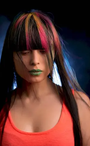 Red strands on dark hair