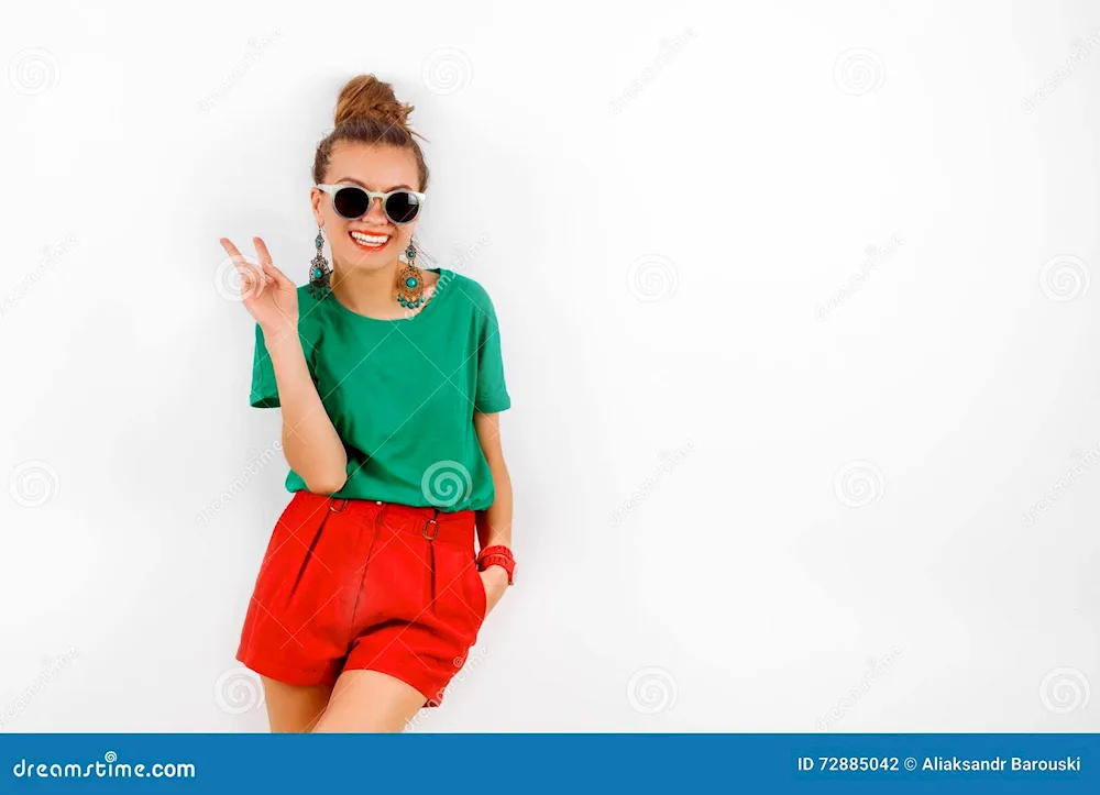 Red shorts and green t-shirt