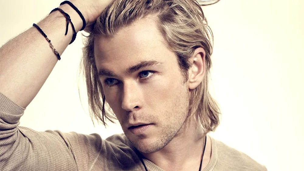 Chris Hemsworth hairstyles man bun