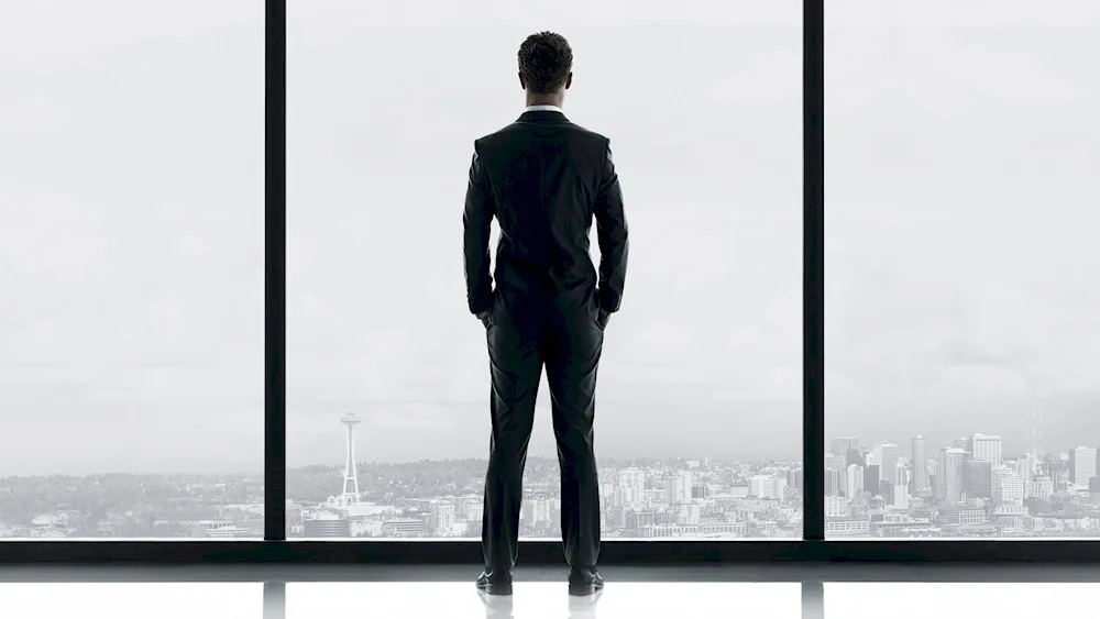Christian Grey at the window