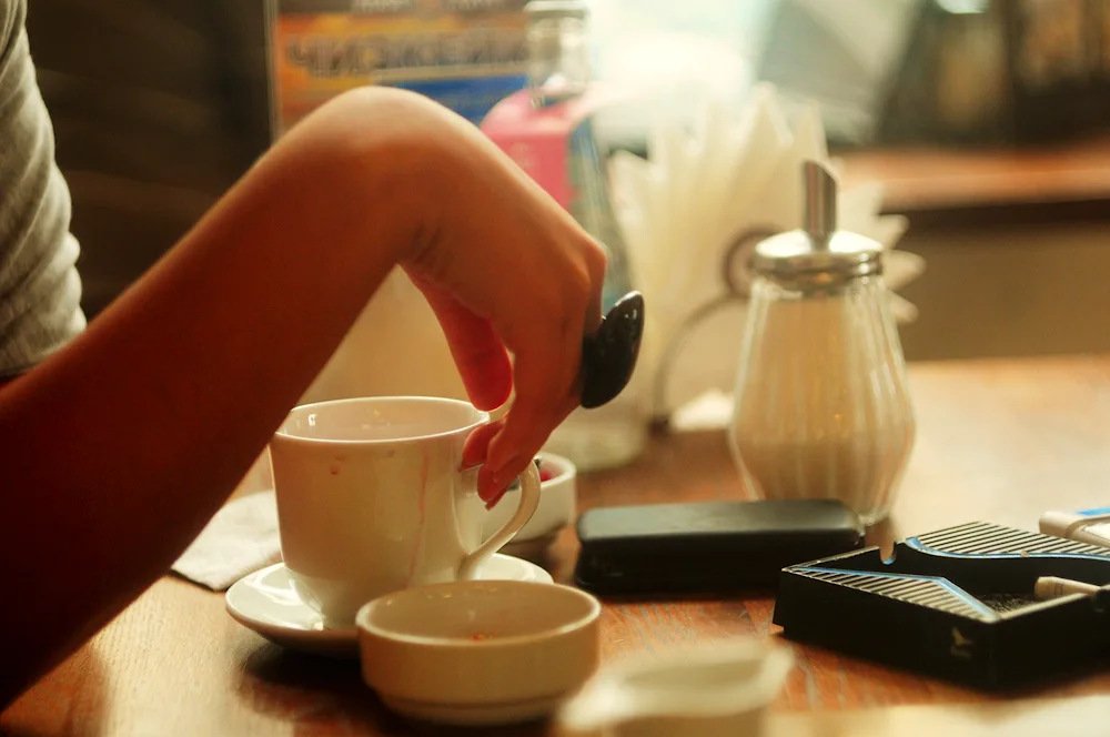 Coffee mug in hands