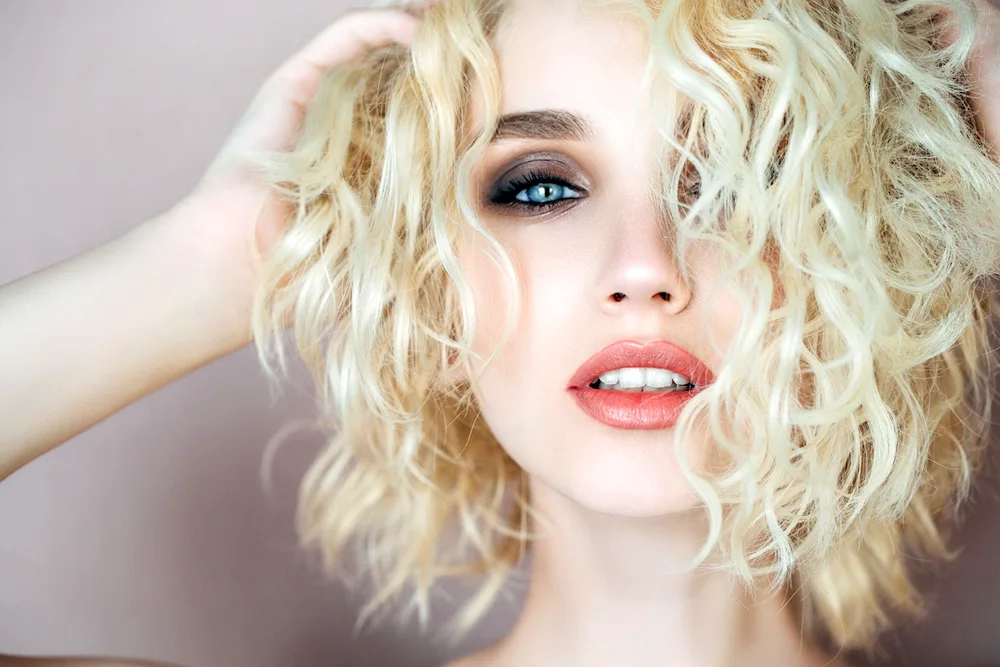 Curly blonde