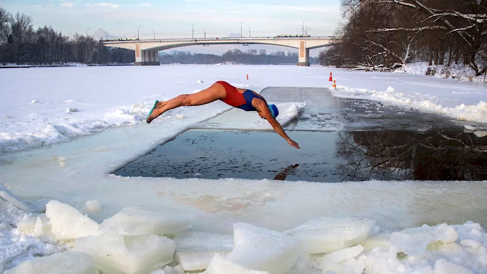 Bathing in an ice-hole.